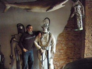 Vazquez posed with one of his many creations in the living room of his house on the 3300 block of North 5th Street.