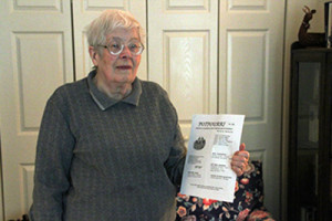 Resident Lee Pollock showed off the latest issue of the Potpourri newsletter.