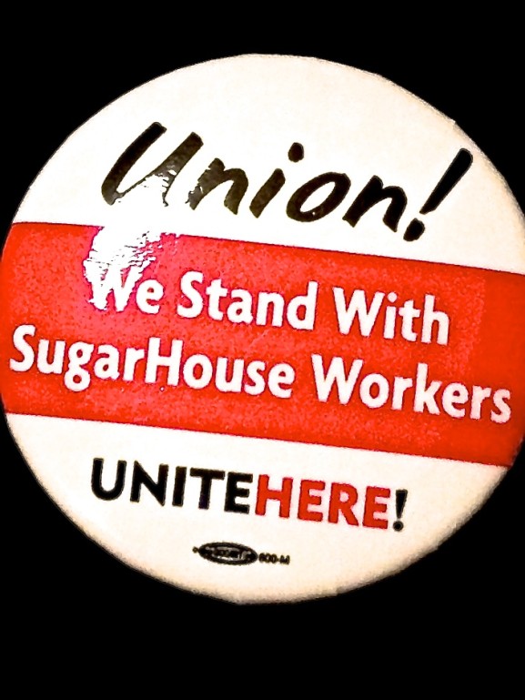 The UNITE HERE pin was worn by protesters standing up for unionization at SugarHouse Casino. 