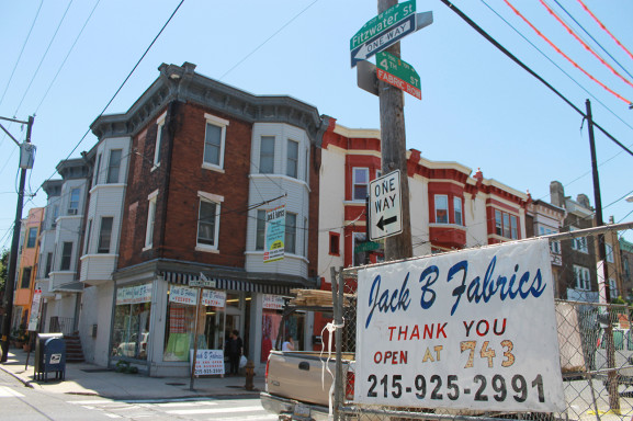The construction site of Jack B Fabrics burned down location is directly across the street from its temporary home.