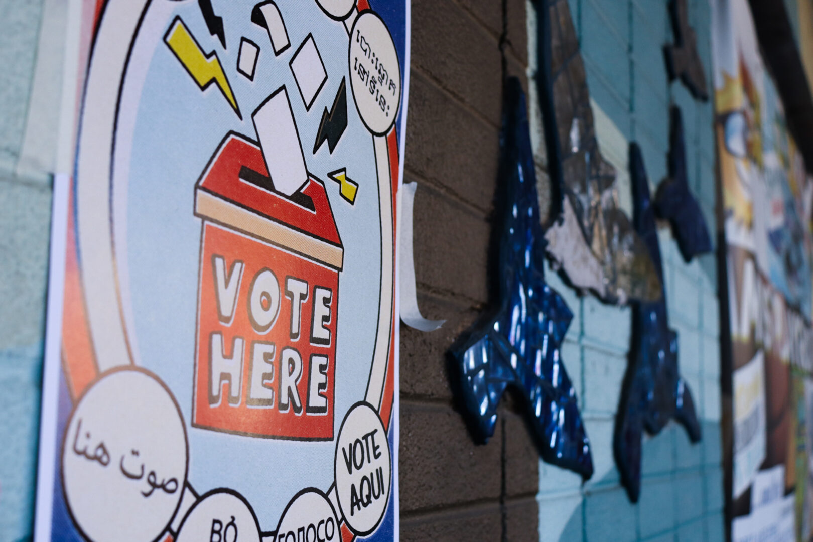 A voting sign is posted on the outside of the Amos Recreation Center in North Philadelphia on Tuesday, Nov. 11, 2025.