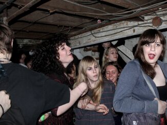 The crowd during a performance by The DOJD, Claire Brown's band, in a West Philadelphia basement. (Image-Jacob Magaldi)