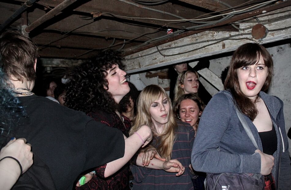 The crowd during a performance by The DOJD, Claire Brown's band, in a West Philadelphia basement. (Image-Jacob Magaldi)